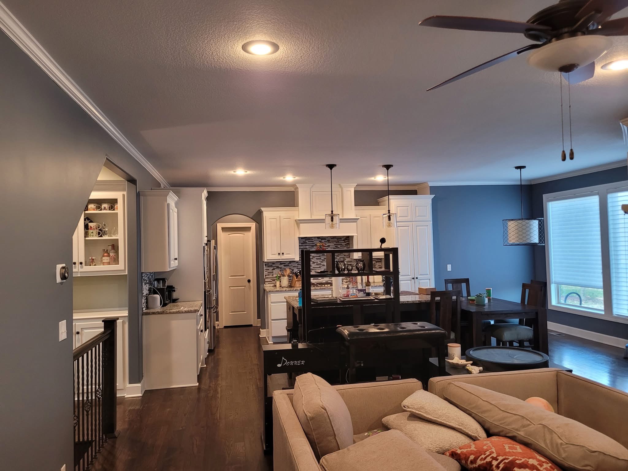 Living room with fireplace after painting.